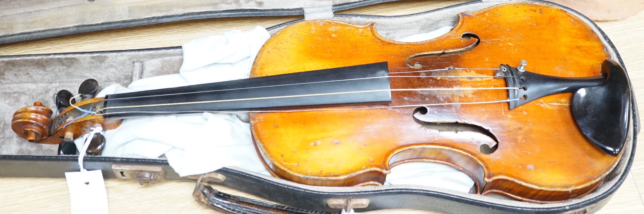 A 19th century French Grandjon school violin, labelled Joseph Guarnerins fecit Cremonae anno 1719 IHS, length of back 35.5 cm (14in.), cased